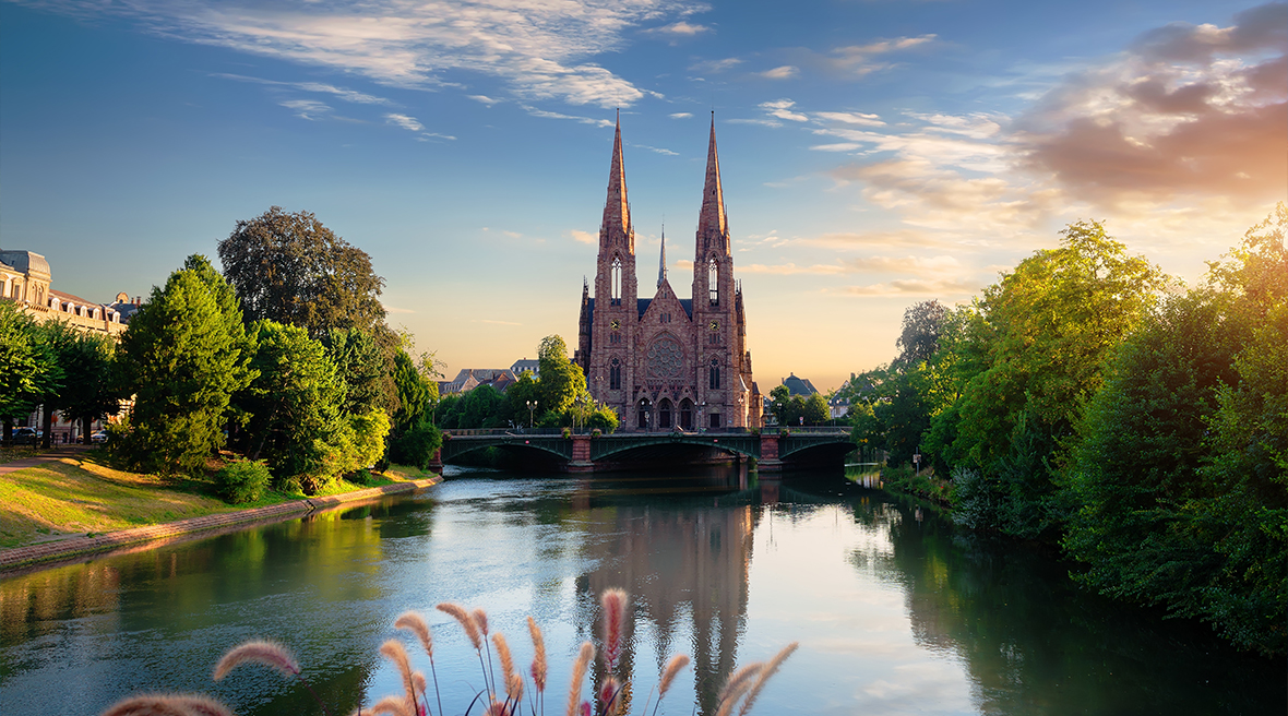 Strasbourg church overlooking river and foliage